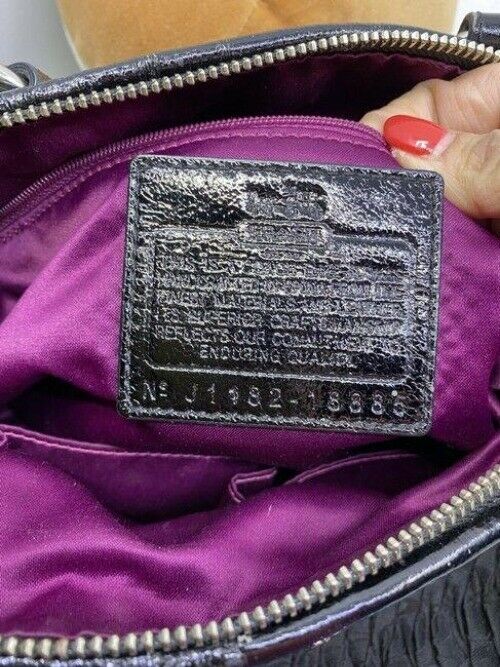coach medium size black jacquard fabric cross body bag