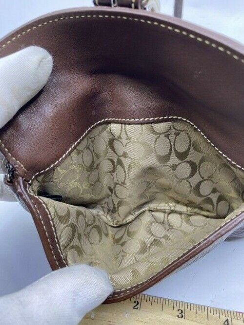 coach textured brown leather wristlet
