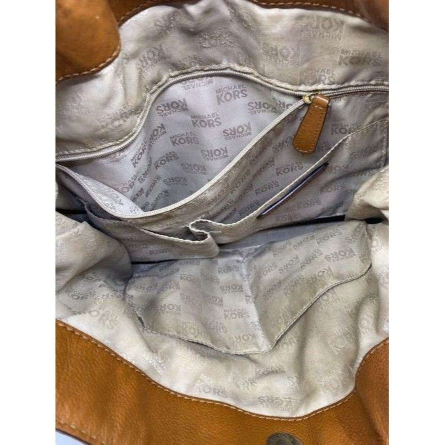 michael kors in need of tlc tanbrown leatherwicker