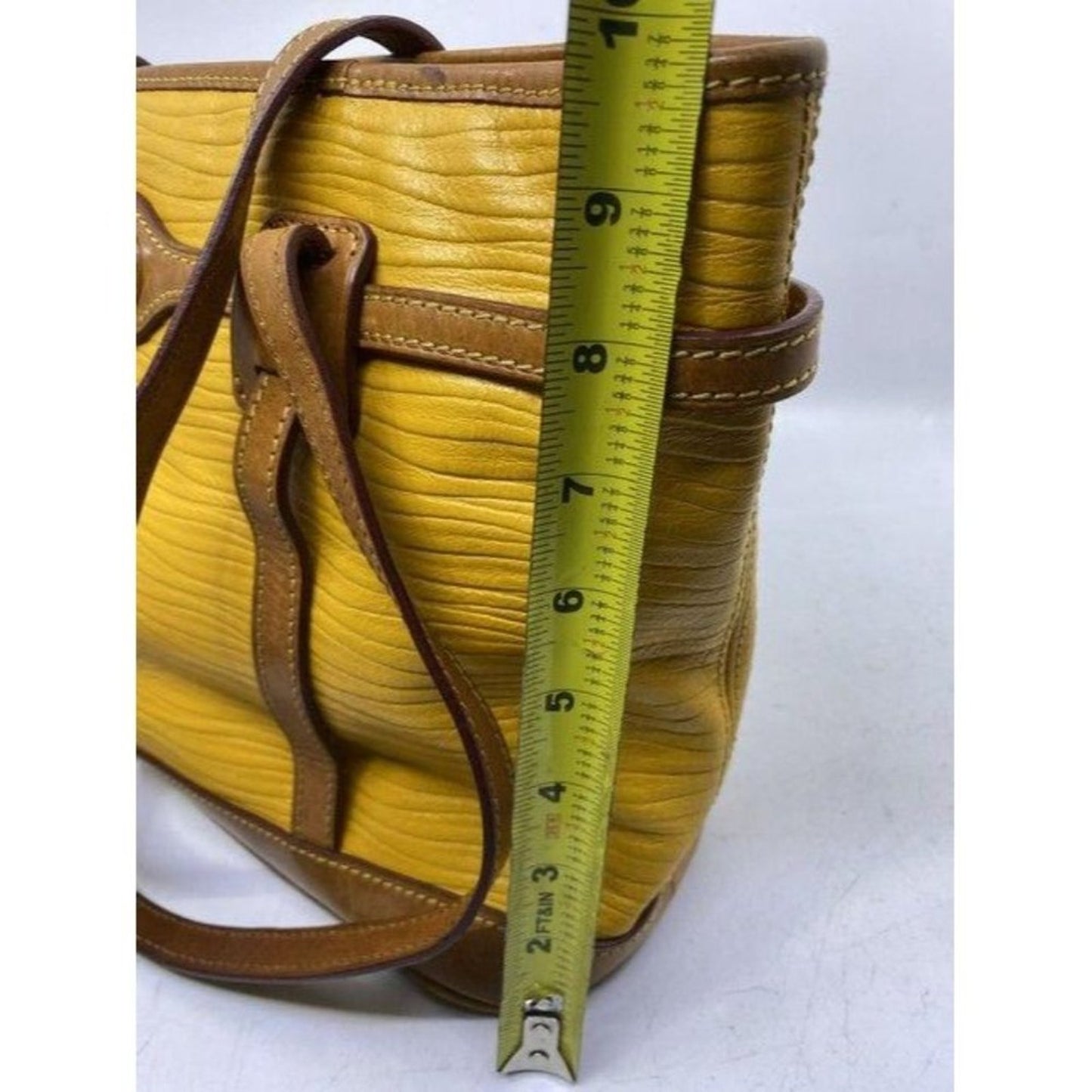 Dooney and Bourke yellow leather shoulder bag