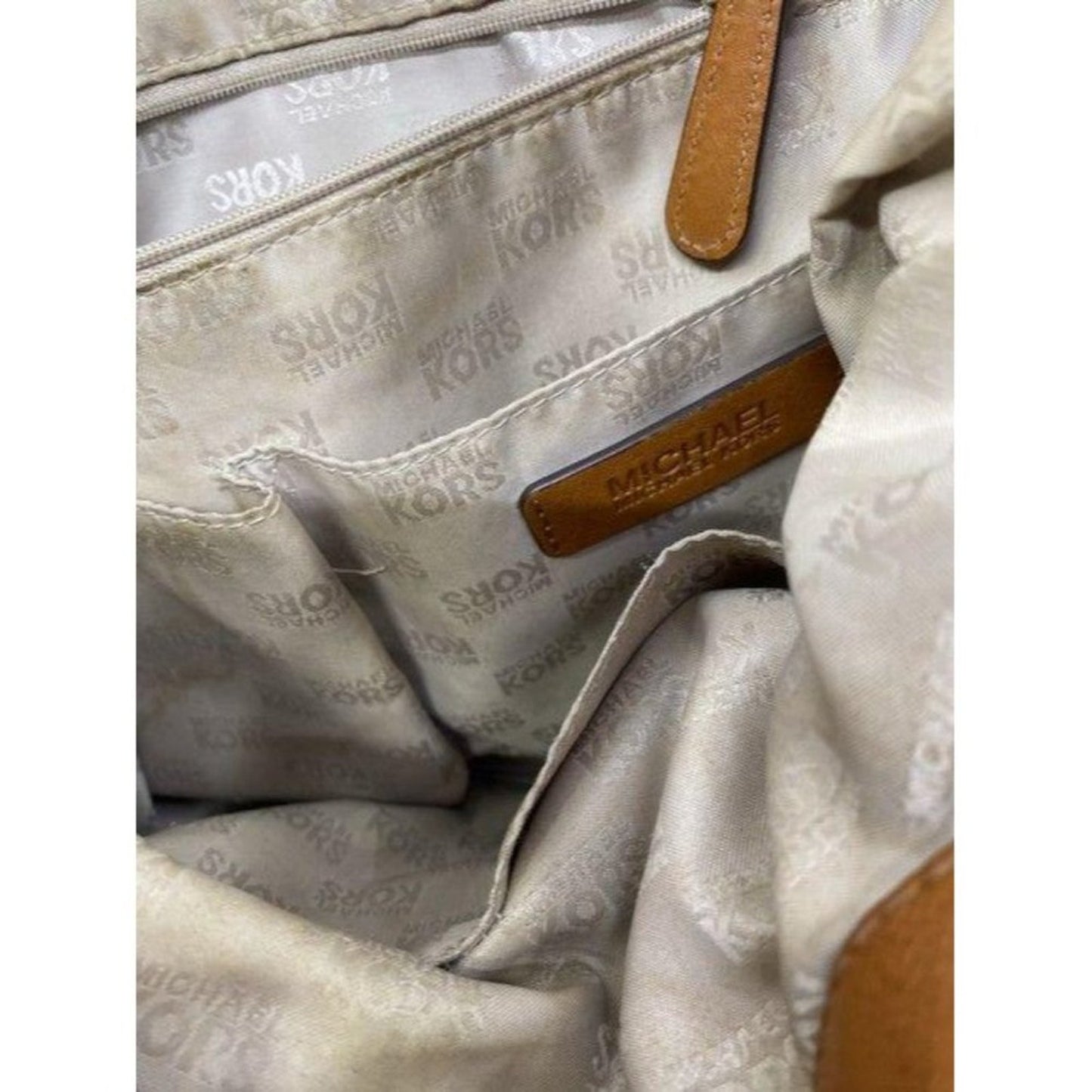 michael kors in need of tlc tanbrown leatherwicker