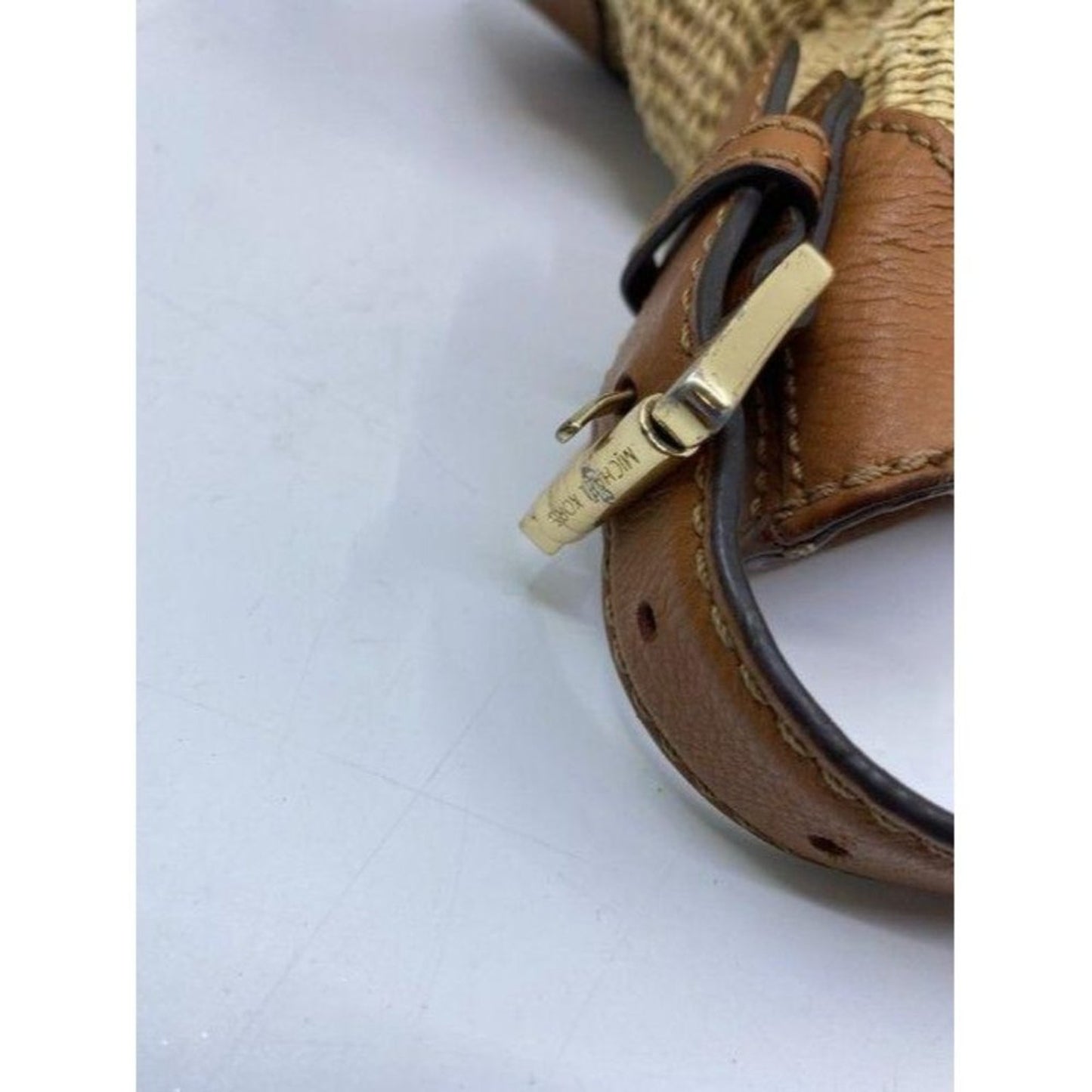 michael kors in need of tlc tanbrown leatherwicker