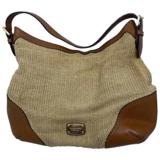 michael kors in need of tlc tanbrown leatherwicker