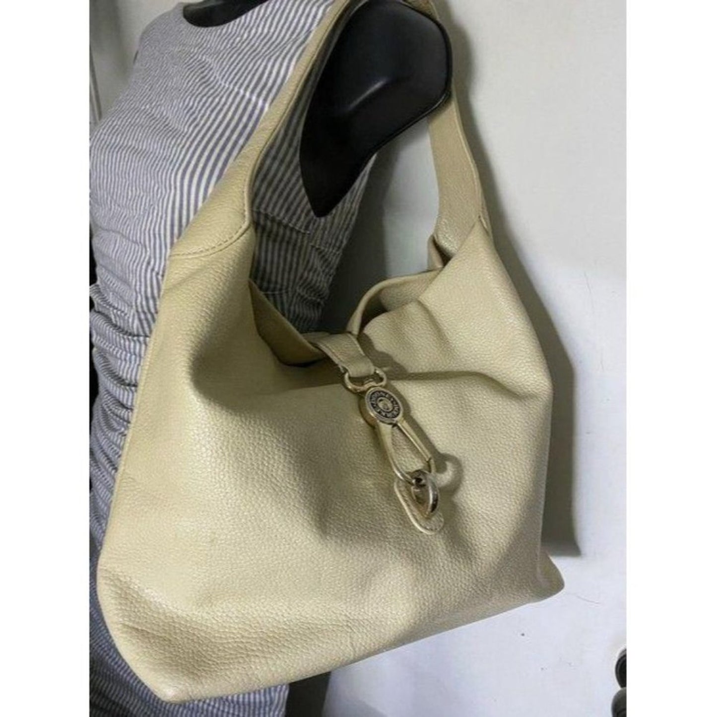 Dooney and Bourke cream leather hobo bag