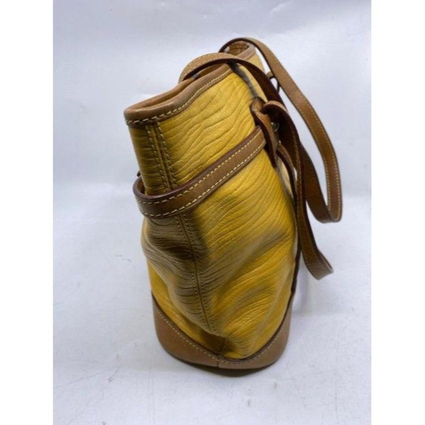 Dooney and Bourke yellow leather shoulder bag