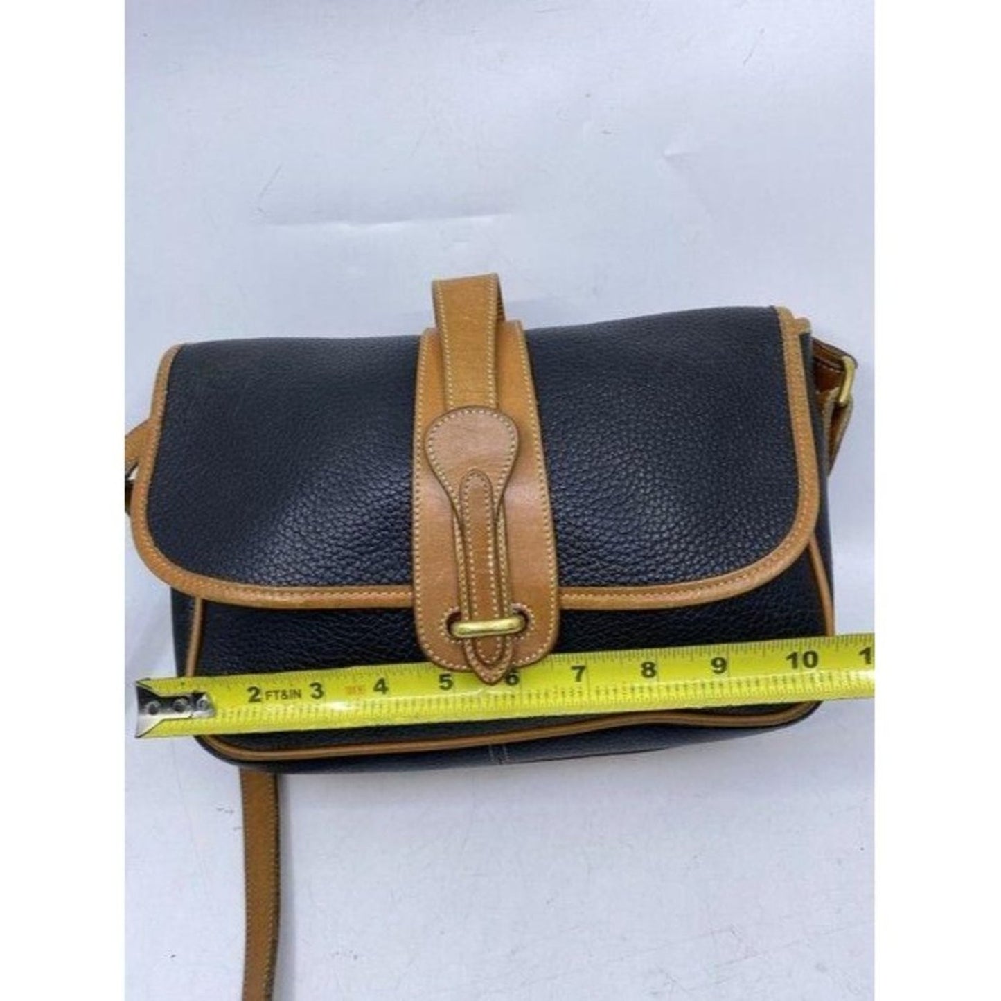 Dooney and Bourke vintage black tan leather cross