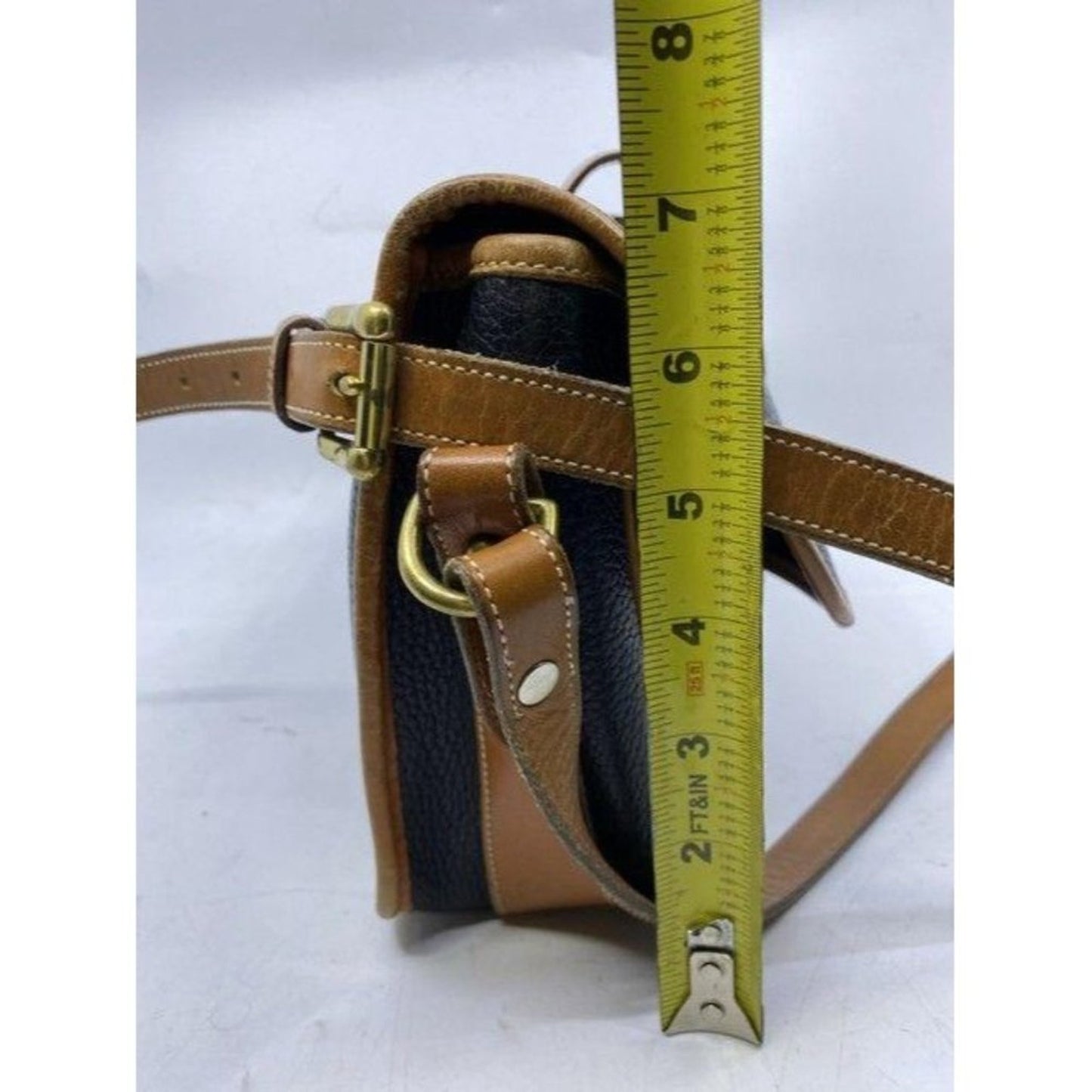 Dooney and Bourke vintage black tan leather cross