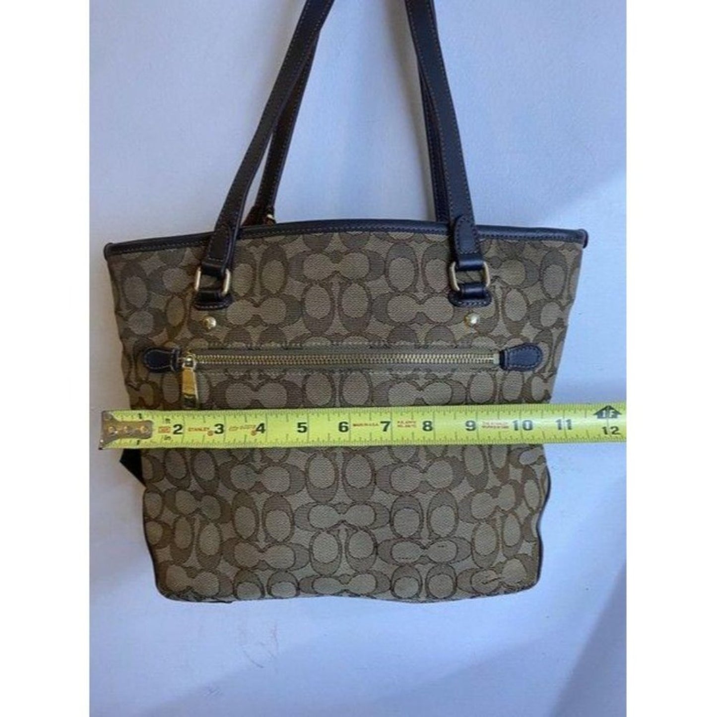 coach w all over logo w add on pooh beige brown ja