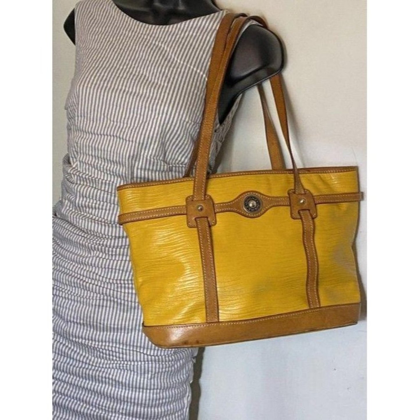 Dooney and Bourke yellow leather shoulder bag