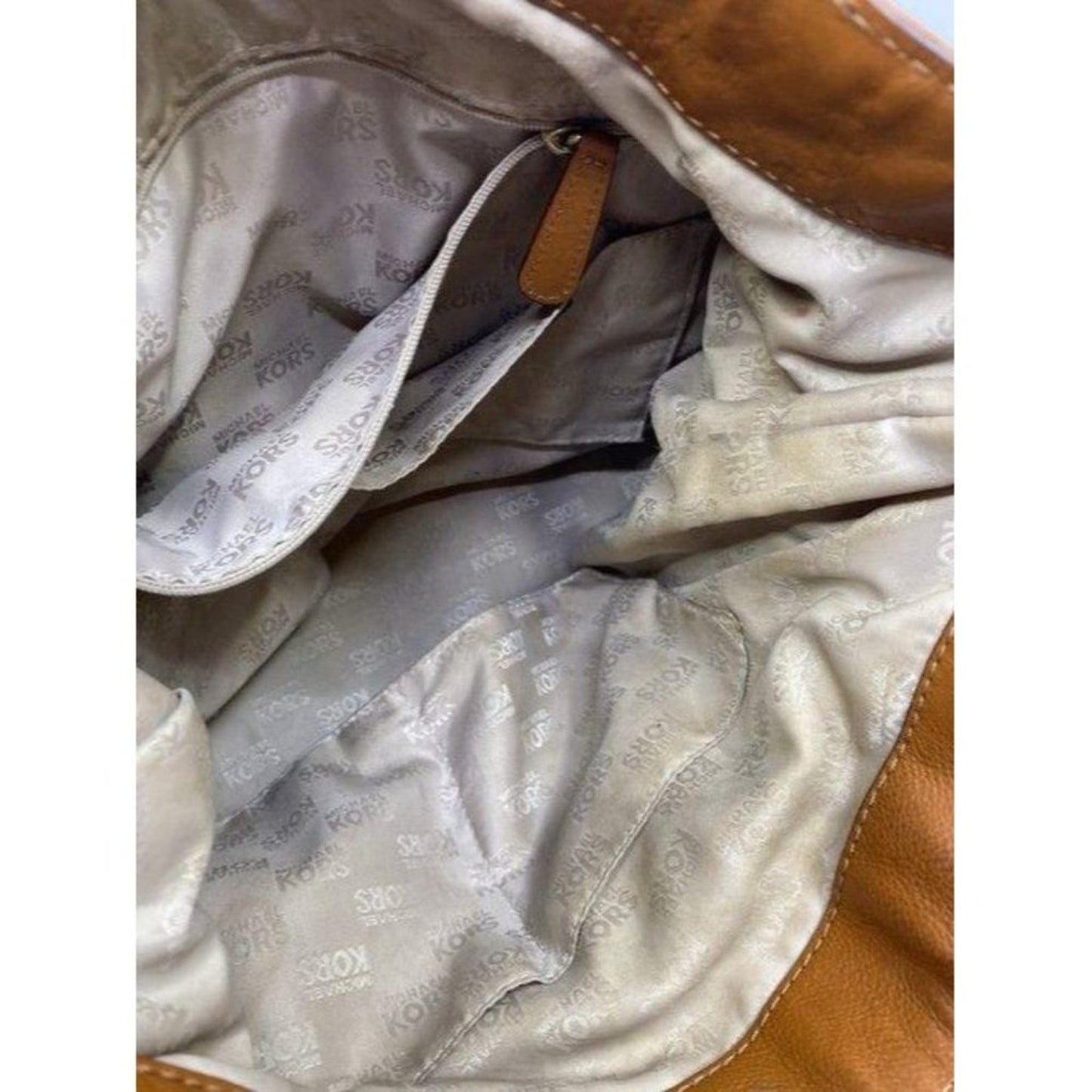 michael kors in need of tlc tanbrown leatherwicker