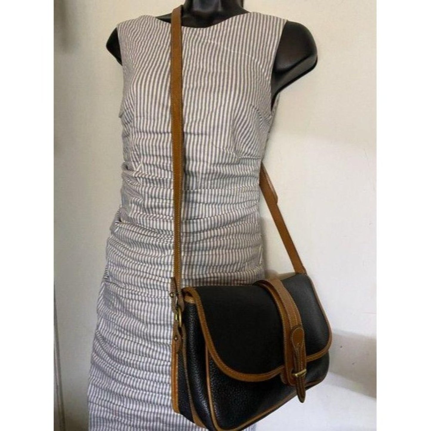 Dooney and Bourke vintage black tan leather cross