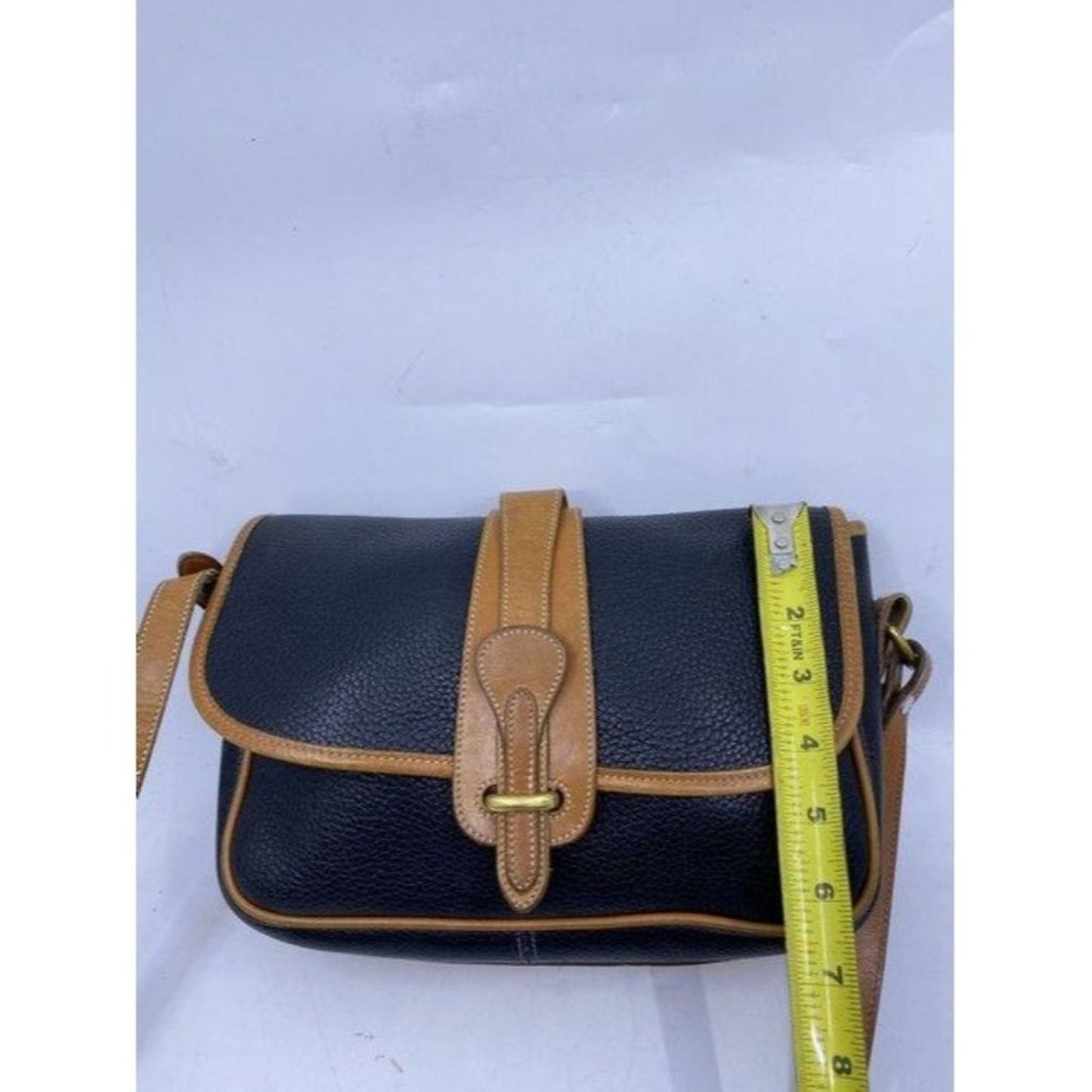 Dooney and Bourke vintage black tan leather cross
