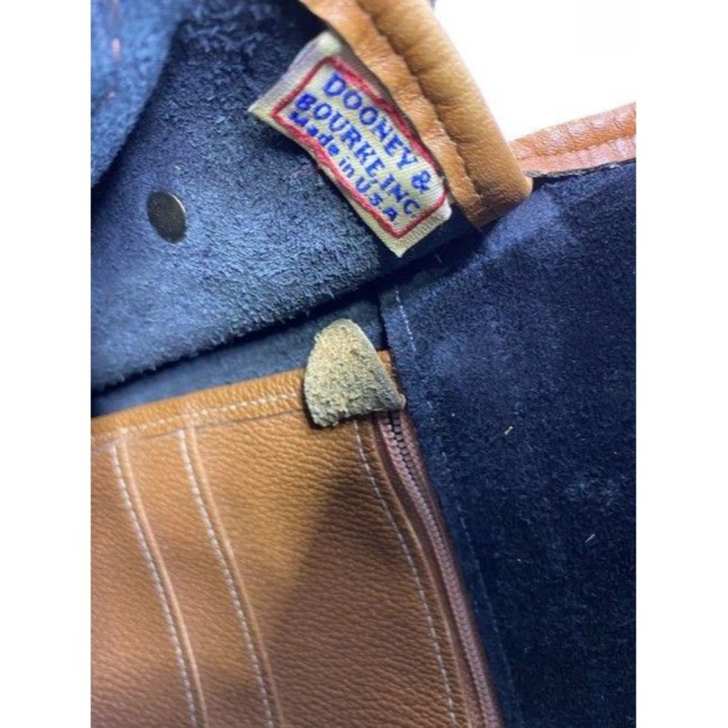 Dooney and Bourke vintage black tan leather cross