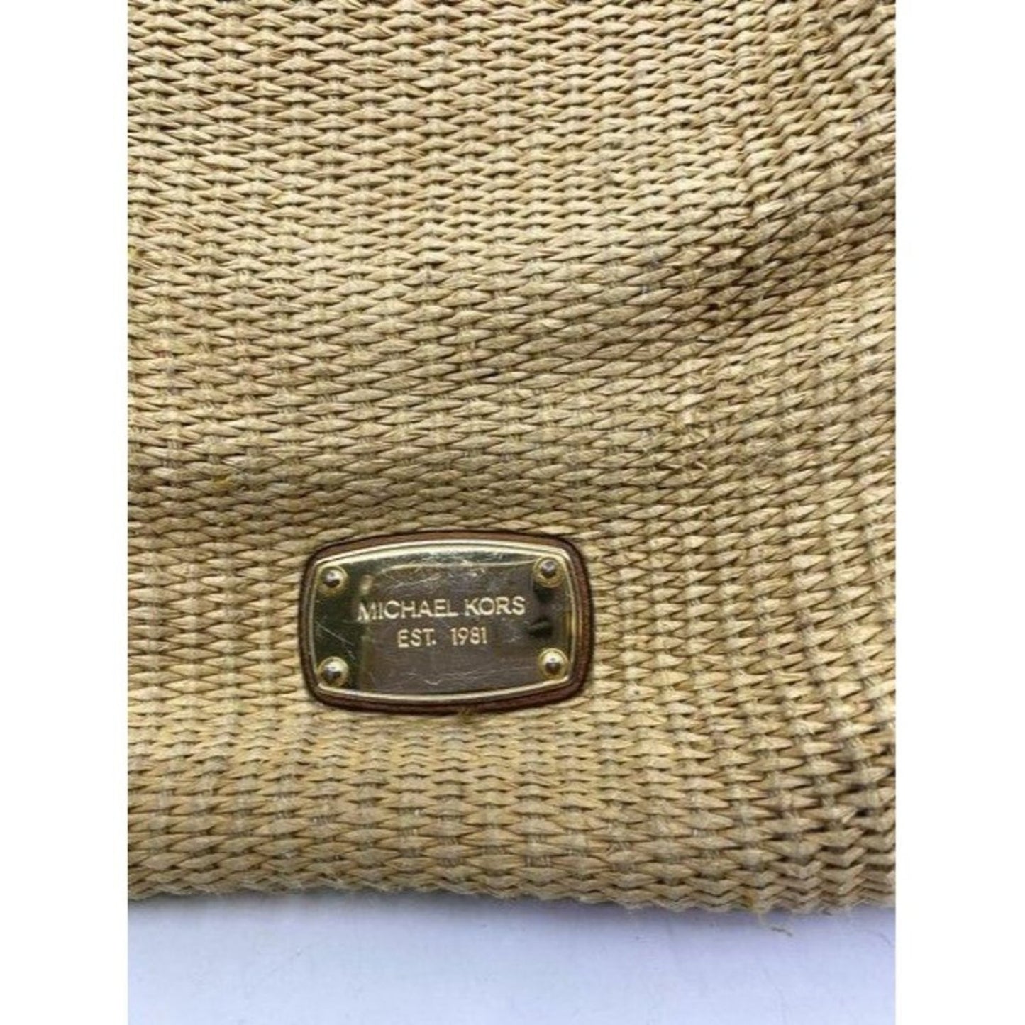 michael kors in need of tlc tanbrown leatherwicker