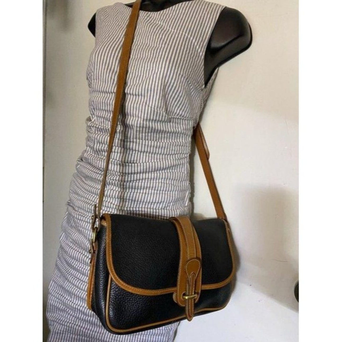 Dooney and Bourke vintage black tan leather cross