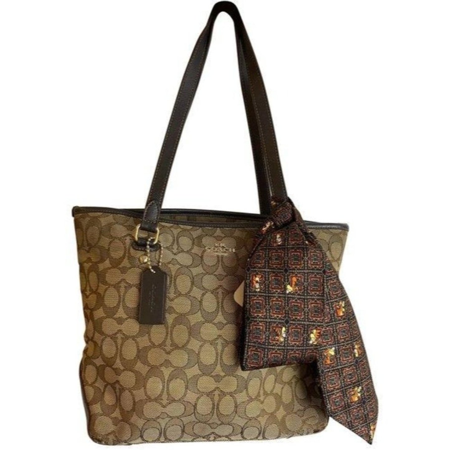 coach w all over logo w add on pooh beige brown ja