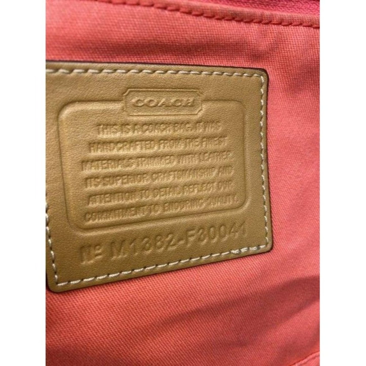 coach tote w shoulder w add on looney tunes tie mu