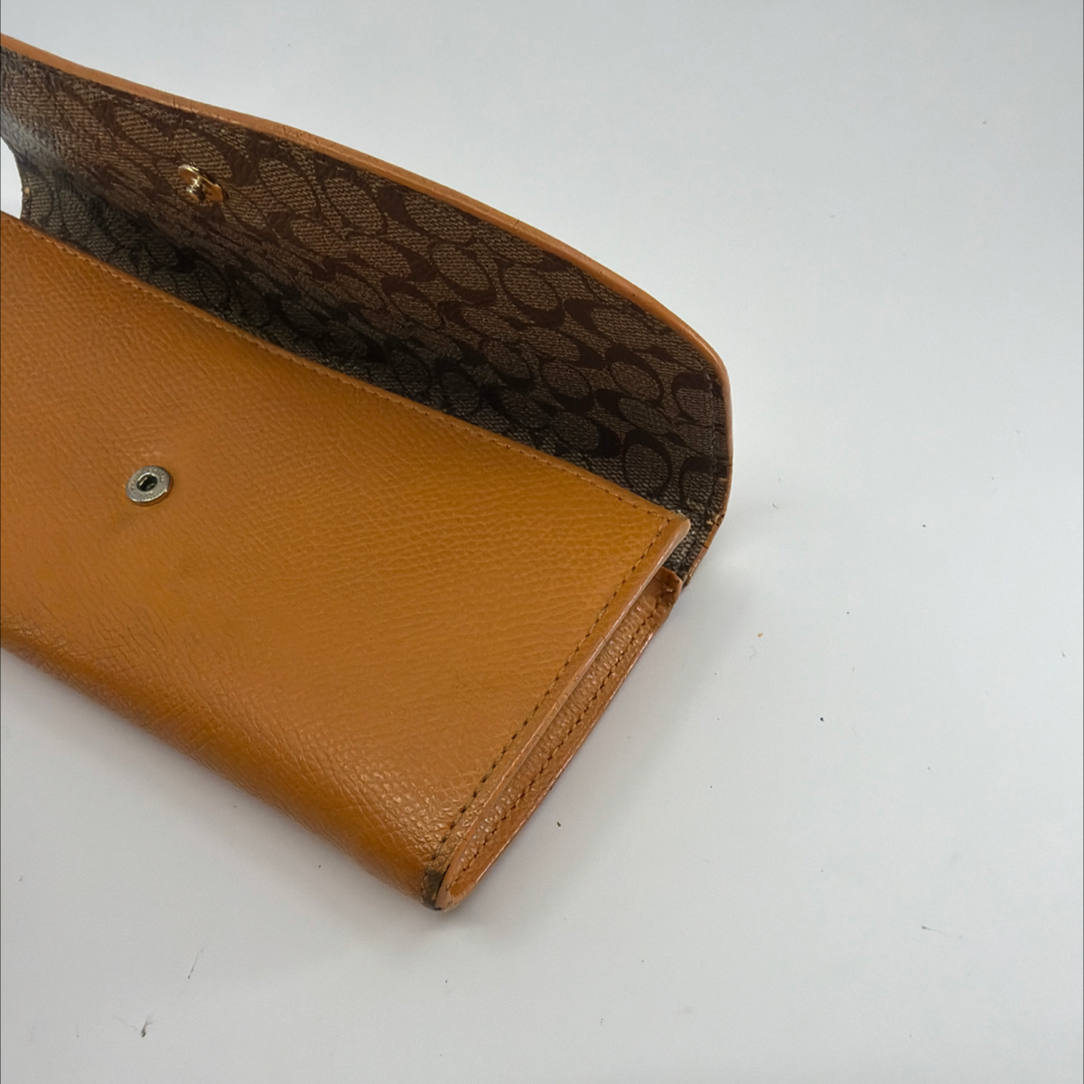 Coach Tan Pebbled Leather Signature Canvas Flap Wallet