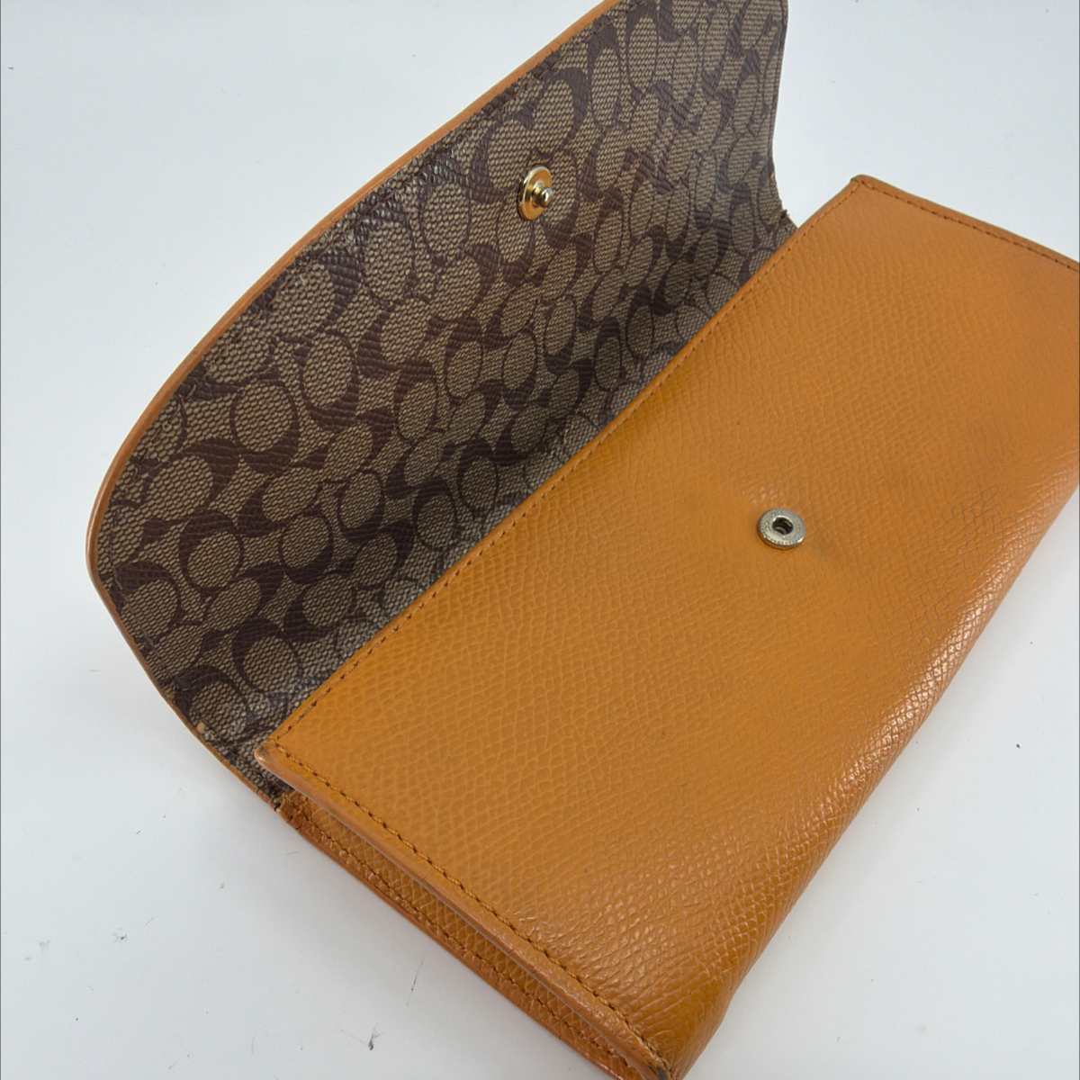 Coach Tan Pebbled Leather Signature Canvas Flap Wallet