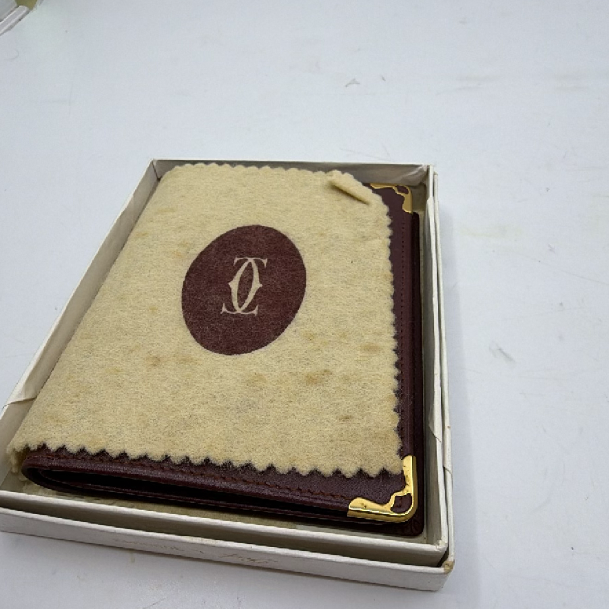 Cartier Must de Cartier Burgundy Leather Passport Holder