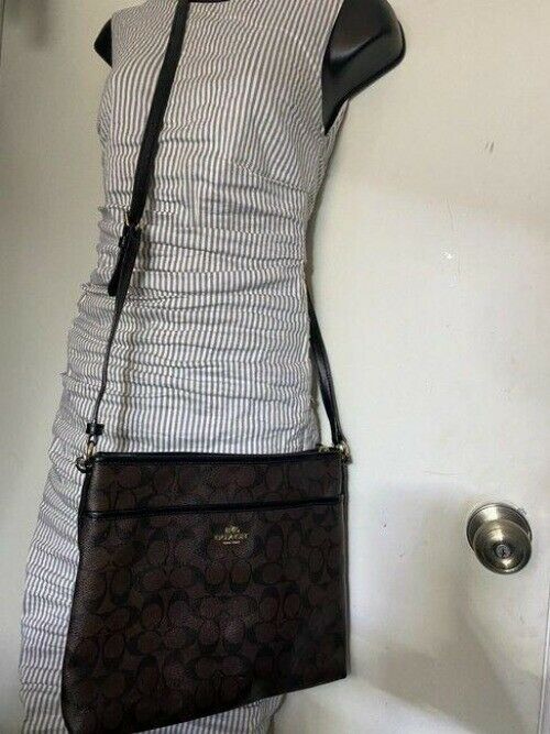 coach large brown coated canvas cross body bag