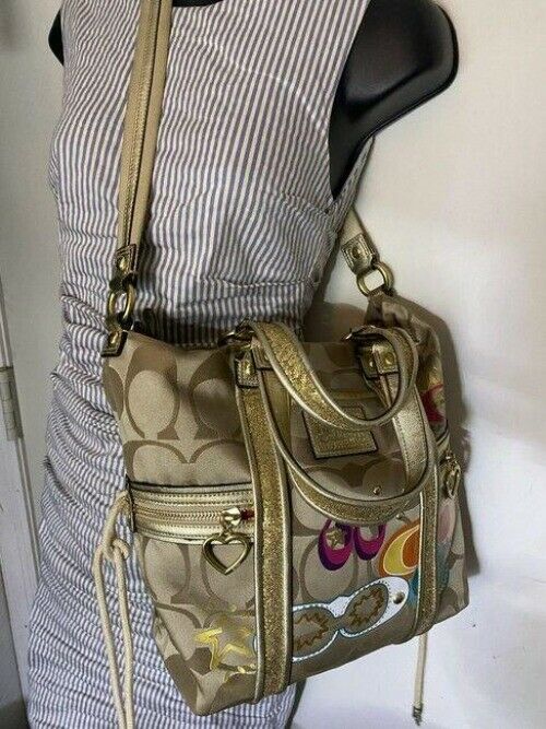 coach msrp gold tan fabric cross body bag