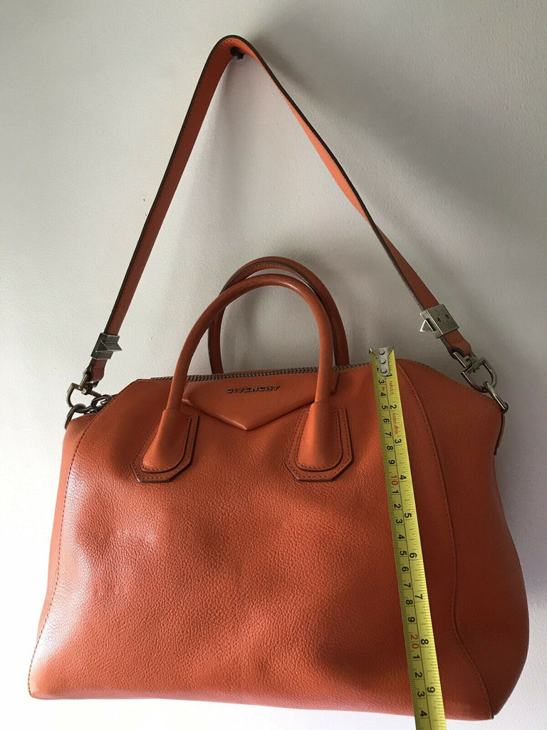 Antigona leather clutch bag Givenchy Orange in Leather - 34811557