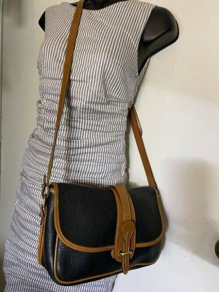 Dooney and Bourke vintage black tan leather cross body bag