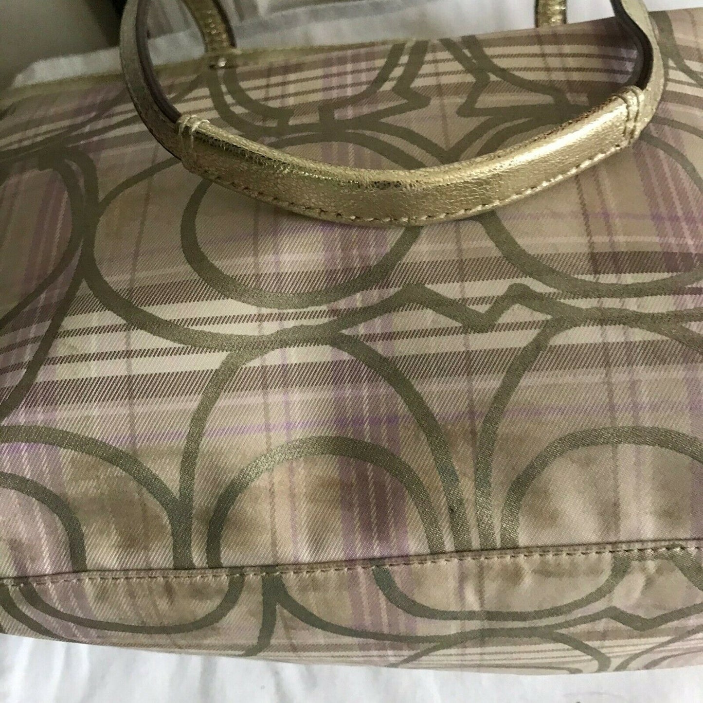 Coach stain fabric khaki tote with multi color logo design
