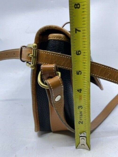 Dooney and Bourke vintage black tan leather cross body bag