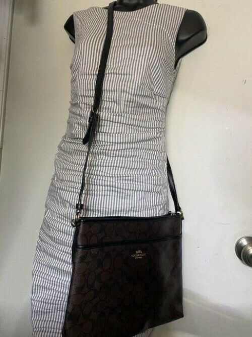 coach large brown coated canvas cross body bag