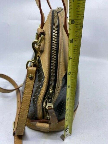 Dooney and Bourke large perforated handbag black tan leather cross body bag