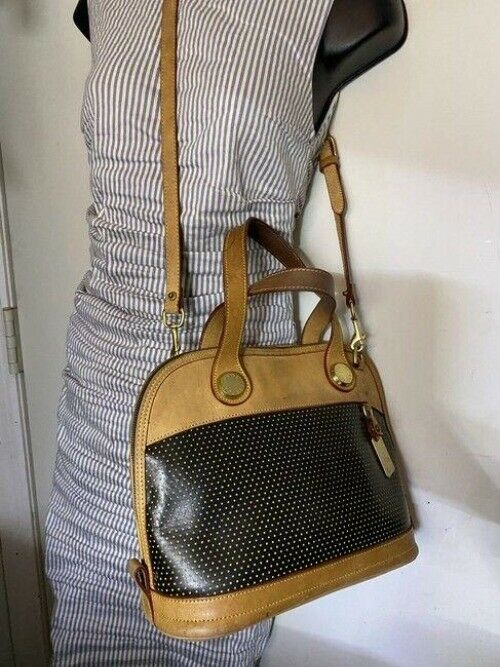 Dooney and Bourke large perforated handbag black tan leather cross body bag