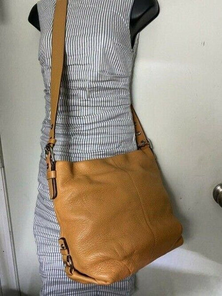 Coach medium orange leather cross body bag