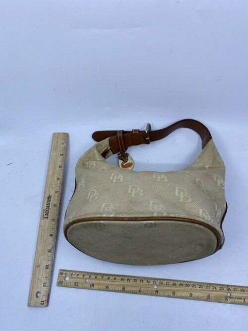 dooney and bourke in need of tlc cream fabric tote