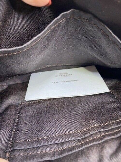 coach small white brown tan coated canvas cross body bag