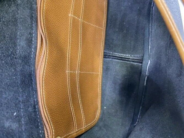 Dooney and Bourke vintage black tan leather cross body bag