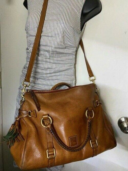 Dooney and Bourke w strap tan leather cross body bag