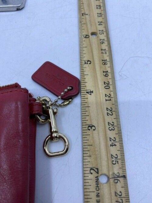 coach double needs strap red wristlet