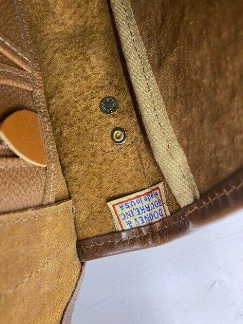 Dooney and Bourke ostritch flap brown leather cross body bag