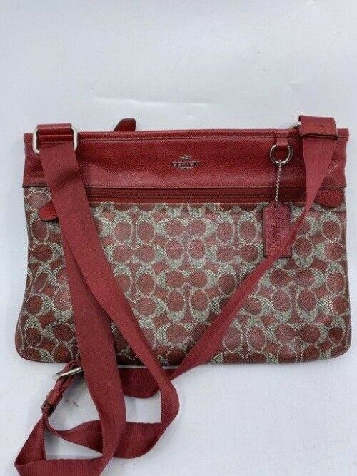 coach all over logo red coated canvas cross body bag