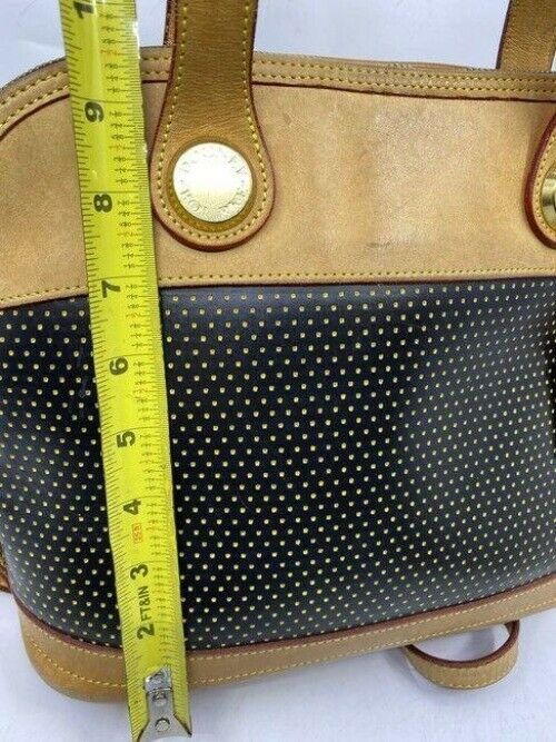 Dooney and Bourke large perforated handbag black tan leather cross body bag