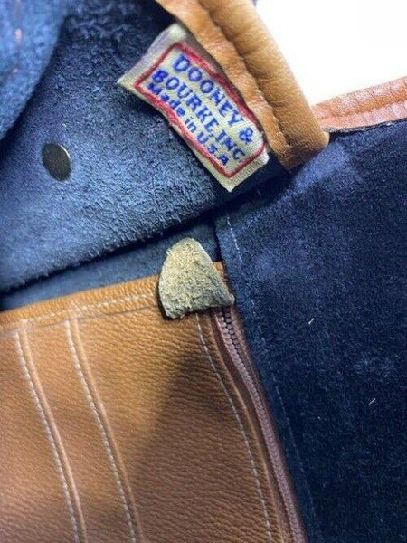 Dooney and Bourke vintage black tan leather cross body bag