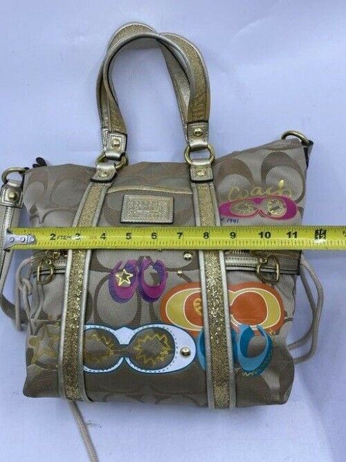 coach msrp gold tan fabric cross body bag