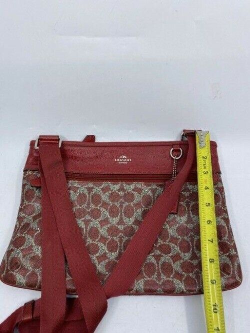 coach all over logo red coated canvas cross body bag