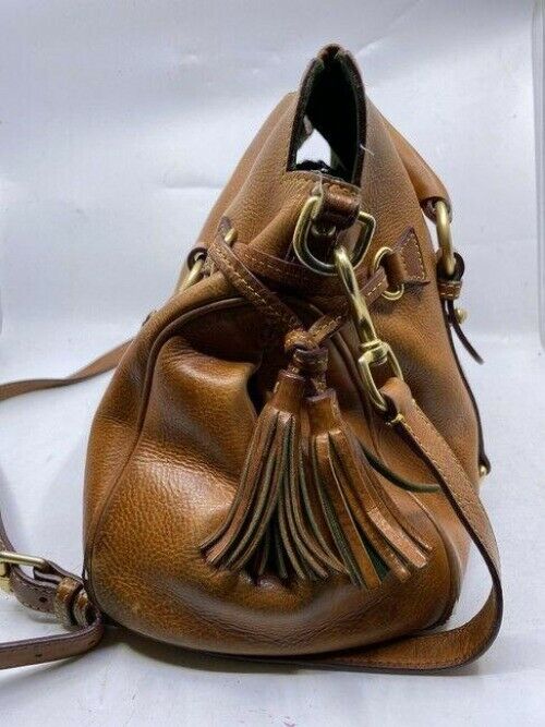 Dooney and Bourke w strap tan leather cross body bag