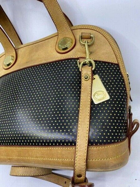 Dooney and Bourke large perforated handbag black tan leather cross body bag