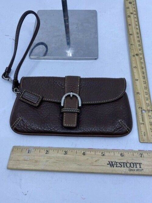 coach textured brown leather wristlet