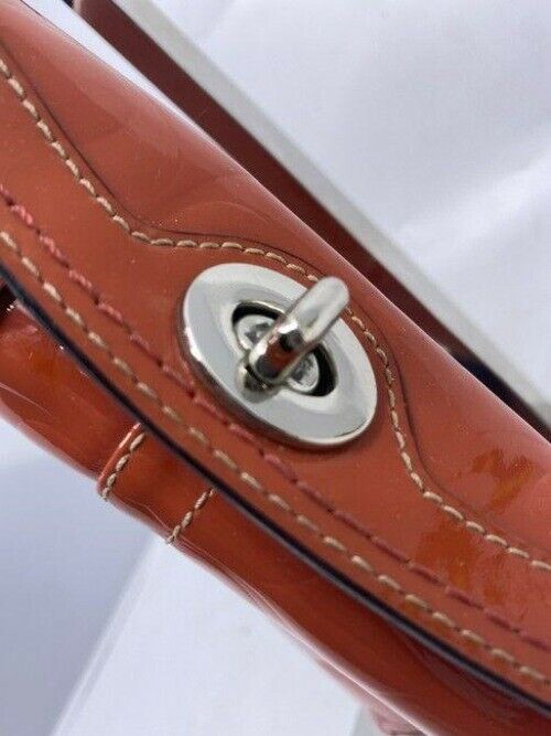 Coach Top Clasp Orange Patent Leather Wristlet