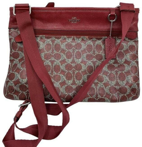 coach all over logo red coated canvas cross body bag
